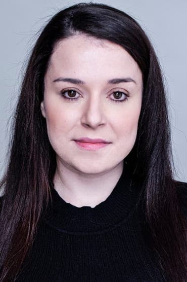 Professional headshot of Dani Harmer